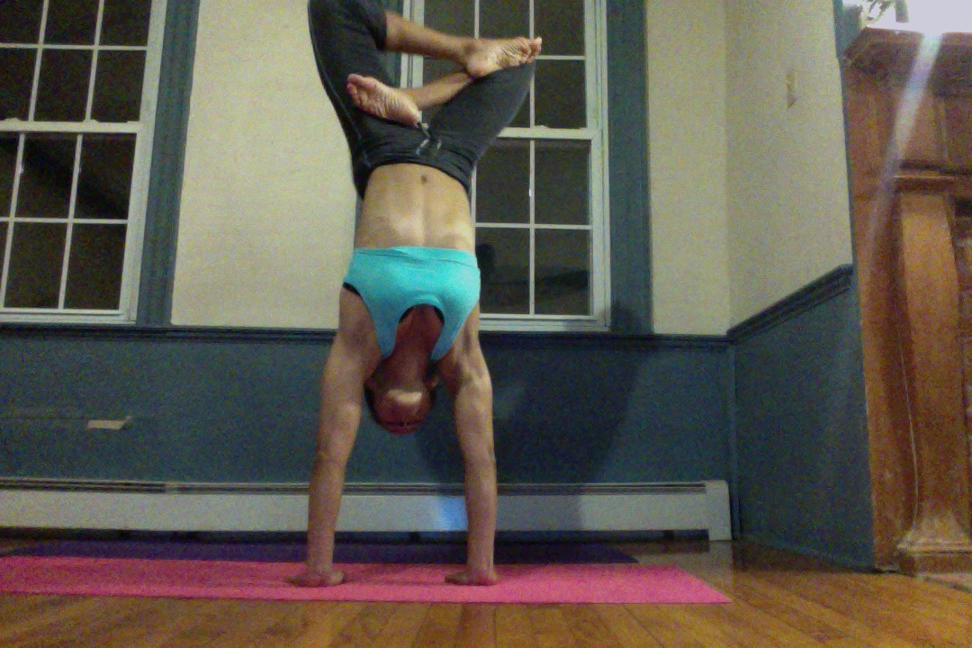 Handstand in Lotus Pose